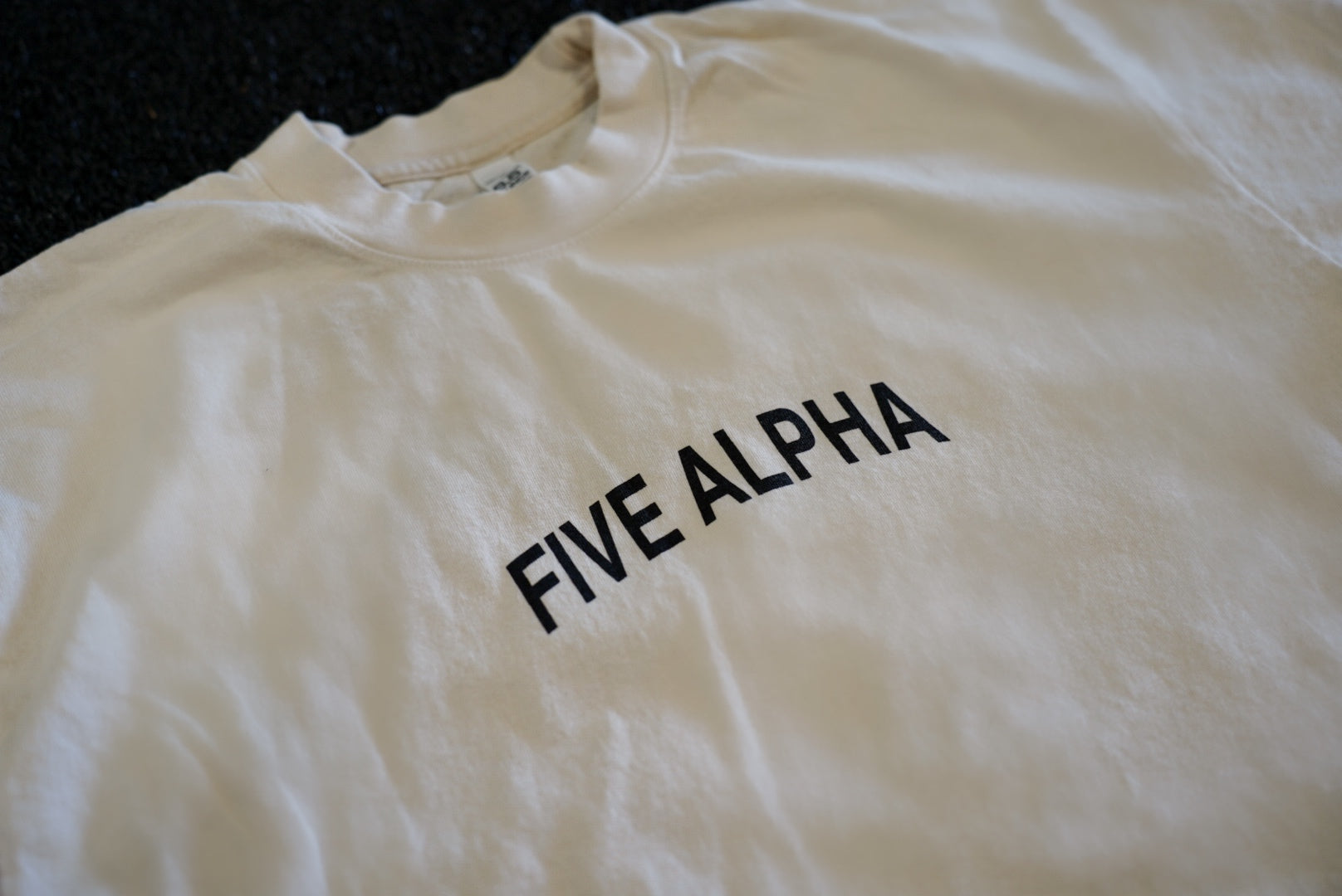 THE SIGNATURE TEE